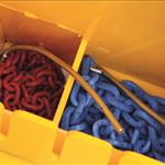 Storage space for chains on the front side of the blade to keep dirt from tractor wheels away.